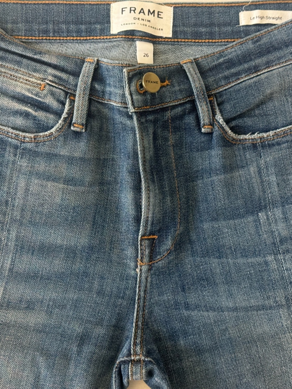 Frame Denim Straight-Leg Jeans in faded blue
